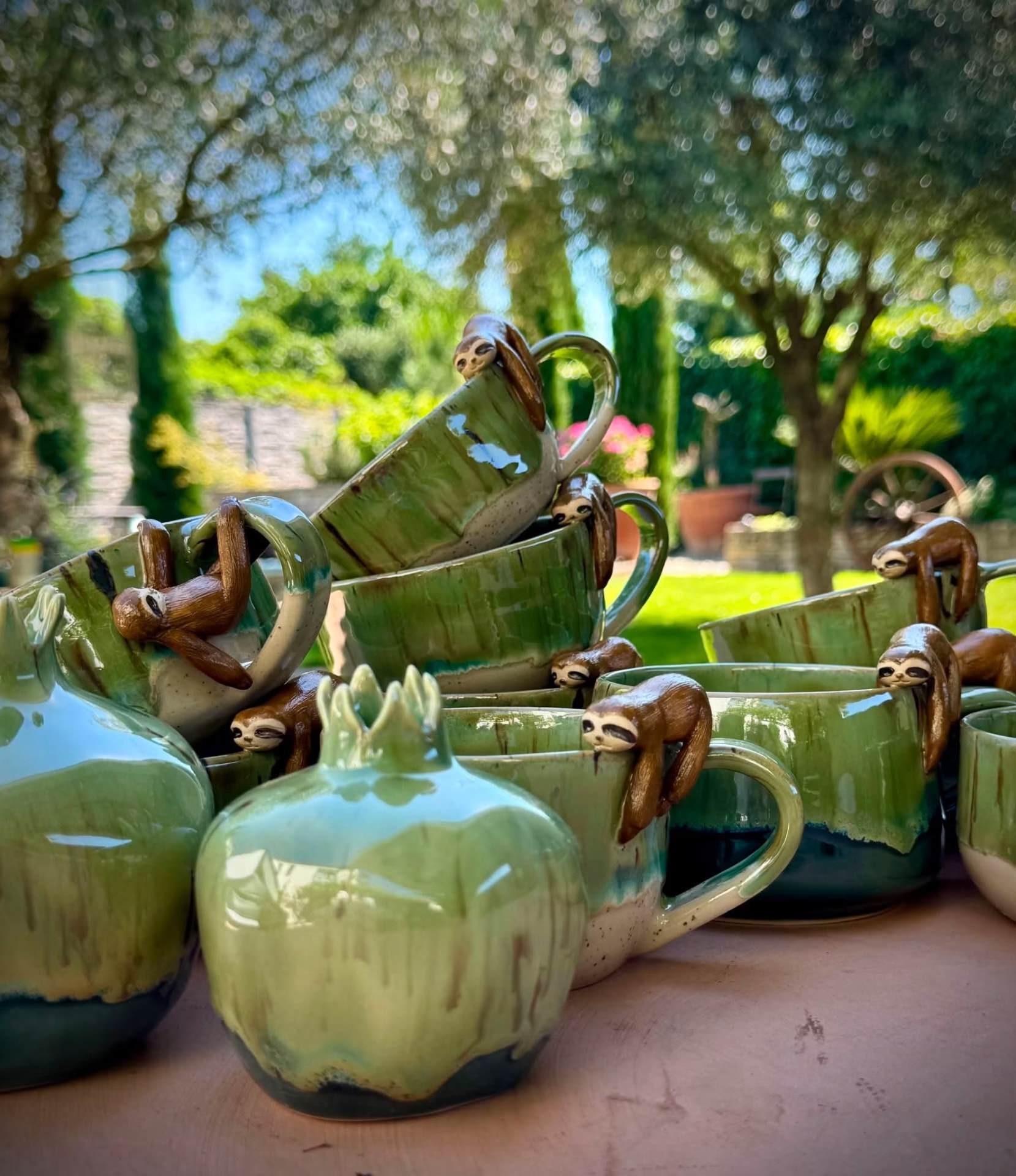 Sloth mugs in the garden